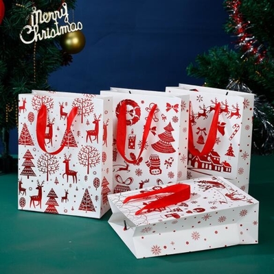 Rectangle 40gsm-150gsm Custom Cardboard Bags Bronzing Christmas Paper Bags With Handles